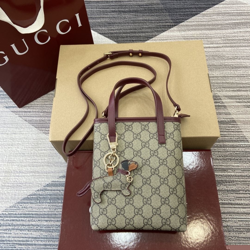 G*u*i top handle bags
